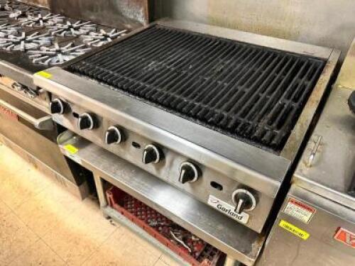 DESCRIPTION: GARLAND 36" RADIANT CHARBROILER BRAND / MODEL: GARLAND ADDITIONAL INFORMATION NATURAL GAS, 120,000 BTU. COMES W/ (2) BASKETS AND (1) STAI