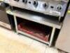 DESCRIPTION: 36" LOW BOY STAINLESS EQUIPMENT STAND W/ BACK AND SIDE SPLASHES BRAND / MODEL: REGENCY ADDITIONAL INFORMATION CONTENTS ARE NOT INCLUDED. - 2