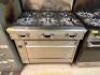 DESCRIPTION: US RANGE SIX BURNER GAS RANGE W/ LOWER OVEN. BRAND / MODEL: US RANGE ADDITIONAL INFORMATION NATURAL GAS. LOCATION: KITCHEN QTY: 1 - 2