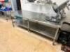 DESCRIPTION: 96" X 36" STAINLESS TABLE W/ STAINLESS UNDER SHELF. ADDITIONAL INFORMATION CONTENTS ARE NOT INCLUDED. SIZE 36" X 96" LOCATION: KITCHEN QT - 2