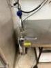DESCRIPTION: 96" X 30" STAINLESS TABLE W/ MOUNTED CAN OPENER - ON CASTERS SIZE 96" X 30'" LOCATION: KITCHEN QTY: 1 - 3