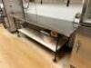 DESCRIPTION: 96" X 30" STAINLESS TABLE W/ MOUNTED CAN OPENER - ON CASTERS SIZE 96" X 30'" LOCATION: KITCHEN QTY: 1 - 4