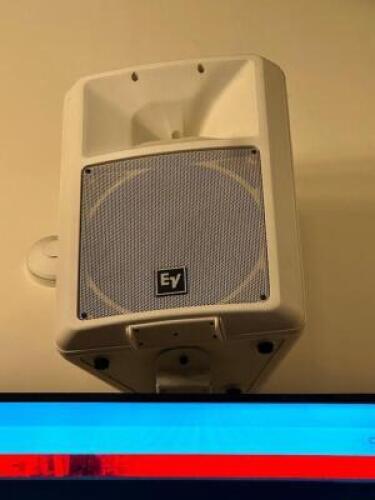 DESCRIPTION: EV SX100+ PASSIVE LOUDSPEAKER W/ WALL MOUNT BRAND / MODEL: EV SX100+ LOCATION: MAIN HALL QTY: 1