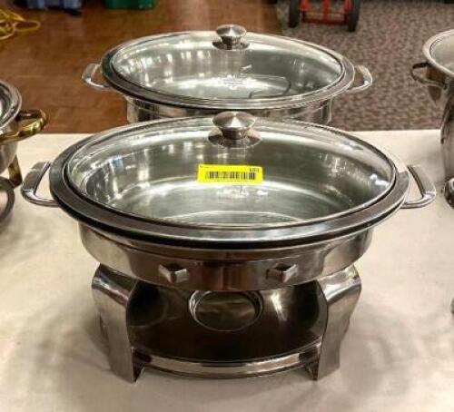 DESCRIPTION: (2) OVAL STAINLESS CHAFING DISHES BRAND/MODEL: TRAMONTINA LOCATION: MAIN HALL QTY: 2