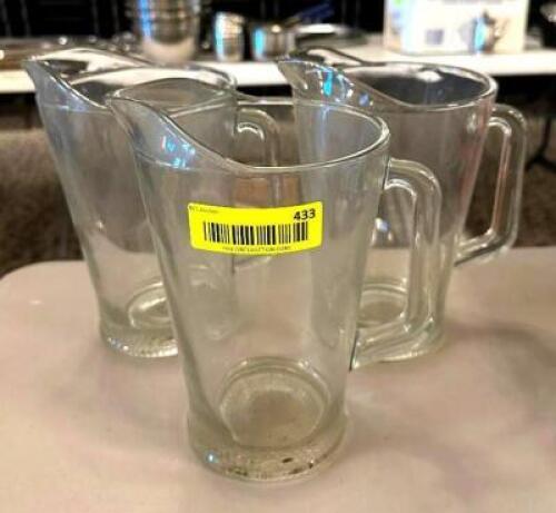 DESCRIPTION: (3) GLASS PITCHERS LOCATION: MAIN HALL QTY: 3