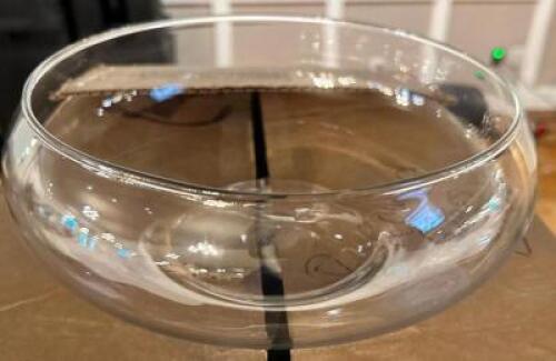 DESCRIPTION: (18) ROUND GLASS BOWL CENTER PIECES LOCATION: MAIN HALL THIS LOT IS: SOLD BY THE PIECE QTY: 18