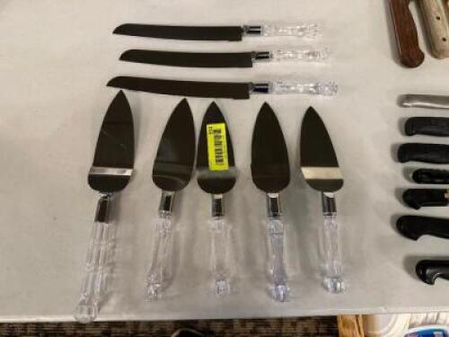 DESCRIPTION: (8) ASSORTED CAKE SERVERS AND KNIVES LOCATION: MAIN HALL THIS LOT IS: SOLD BY THE PIECE QTY: 8