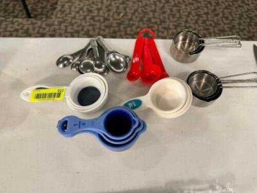 DESCRIPTION: (1) LOT OF ASSORTED MEASURING CUPS AND SPOONS, LOCATION: MAIN HALL THIS LOT IS: ONE MONEY QTY: 1