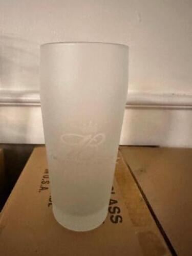 DESCRIPTION: (24) 20 OZ LOGO PUB GLASSES BRAND / MODEL: LIBBEY 196 LOCATION: MAIN HALL THIS LOT IS: SOLD BY THE PIECE QTY: 24