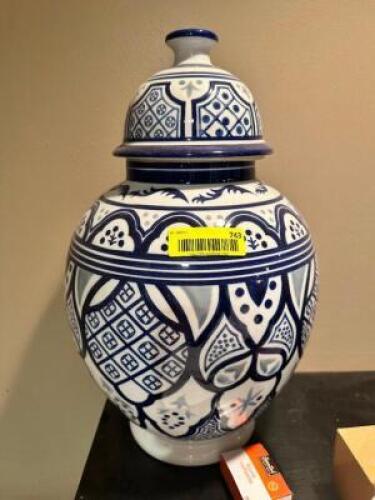 DESCRIPTION: WHITE AND BLUE VASE W/ LID ADDITIONAL INFORMATION APPROX 20" TALL LOCATION: MAIN HALL QTY: 1