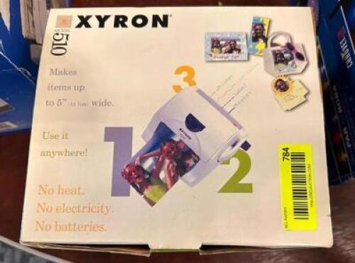 DESCRIPTION: XYRON 510 PHOTO PRINTER LOCATION: MAIN HALL QTY: 1