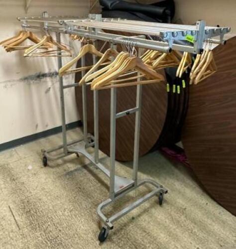 DESCRIPTION: CLOTHING RACK WITH HANGERS LOCATION: FRONT ENTRANCE CLOSET QTY: 1