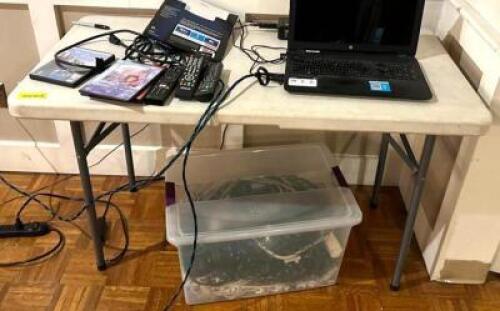 DESCRIPTION: 4' PLASTIC FOLDING TABLE INFORMATION: CONTENTS NOT INCLUDED, SECOND DAY PICKUP ONLY LOCATION: MAIN HALL QTY: 1