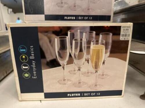 DESCRIPTION: (7) 12CT BOXES OF CHAMPAGNE FLUTE GLASSES BRAND/MODEL: EVERYDAY BASICS LOCATION: SHED QTY: 7