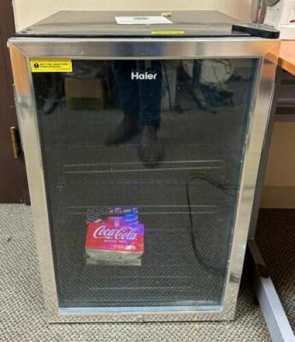 DESCRIPTION: GLASS DOOR BEVERAGE CENTER REFRIGERATOR BRAND/MODEL: HAIER HBCN05FVS LOCATION: MAIN OFFICE QTY: 1