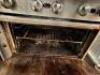 DESCRIPTION: JADE RANGE SIX BURNER RANGE W/ LOWER OVEN BRAND / MODEL: JADE RANGE ADDITIONAL INFORMATION NATURAL GAS. W/ TWO TIER STAINLESS OVER SHELF - 4