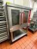 DESCRIPTION: VULCAN SINGLE DECK ELECTRIC CONVECTION OVEN. BRAND / MODEL: VC4ED ADDITIONAL INFORMATION SN# 54-1012136, 208 VOLT, 3 / 1 PHASE. ON CASTER - 2