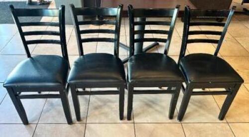 DESCRIPTION: (4) BLACK LADDER BACK WOODEN CHAIRS W/ BLACK VINYL SEAT CUSHIONS LOCATION: FRONT THIS LOT IS: SOLD BY THE PIECE QTY: 4