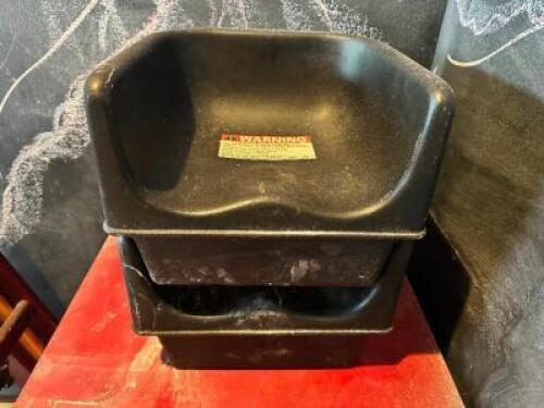DESCRIPTION: (2) BLACK PLASTIC BOOSTER SEATS LOCATION: FRONT THIS LOT IS: SOLD BY THE PIECE QTY: 2