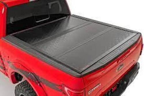 DESCRIPTION: (1) HARD FOLDING COVER FOR TRUCK BED BRAND/MODEL: ROUGH COUNTRY #RC-15 INFORMATION: FITS 5' BED WITH OR OR WITHOUT UTILI-TRACK SYSTEM RET