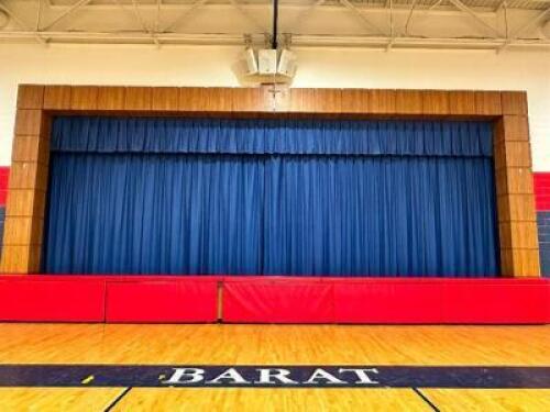 RETRACTABLE BLUE STAGE CURTAIN W/ BAR AND PULLEY SYSTEM