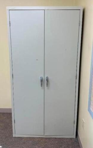 2-DOOR METAL STORAGE CABINETLOCATION ROOM 105SIZE: 36" X 24" X 22"