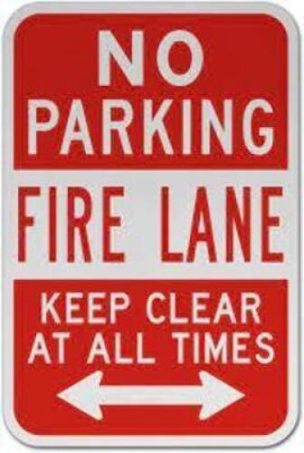 (2) NO PARKING SIGNS