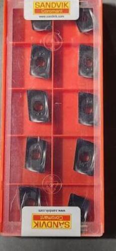 DESCRIPTION: (10) CARBIDE MILLING INSERTS BRAND/MODEL: SANDVIK R390-18 06 08M-PM 4240 RETAIL$: 27.90 PER INSERT QTY: 10