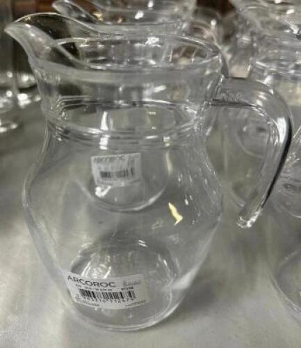 (12) SMALL CLEAR GLASS PITCHERS