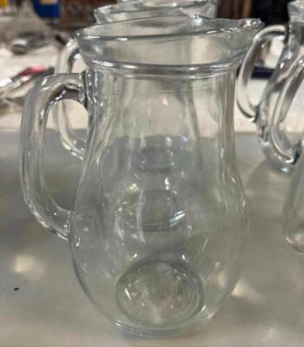 (9) ASSORTED LARGER CLEAR GLASS PITCHERS