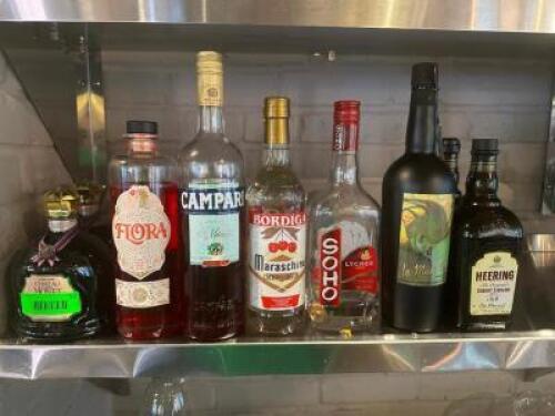 DESCRIPTION: (9) ASSORTED OPEN BOTTLES OF ALCOHOL LOCATION: UPSTAIRS THIS LOT IS: ONE MONEY QTY: 1