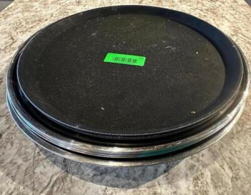 DESCRIPTION: (5) ASSORTED 15" DRINK SERVING TRAYS ADDITIONAL INFORMATION STAINLESS AND BLACK PLASTIC LOCATION: UPSTAIRS THIS LOT IS: SOLD BY THE PIECE
