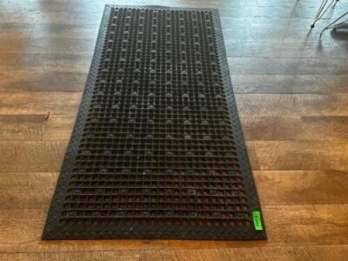 DESCRIPTION: 4' X 24" BLACK RUBBER KITCHEN MAT LOCATION: UPSTAIRS QTY: 1