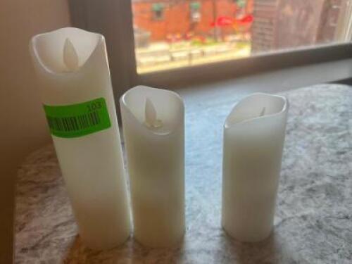 DESCRIPTION: (10) BATTERY POWERED FAUX CANDLES ADDITIONAL INFORMATION (3) UPSTAIRS AND (7) ON MAIN FLOOR LOCATION: UPSTAIRS THIS LOT IS: ONE MONEY QTY