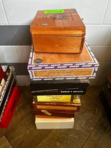 DESCRIPTION: (8) ASSORTED EMPTY CIGAR BOXES LOCATION: BAR / MAIN FLOOR THIS LOT IS: ONE MONEY QTY: 1