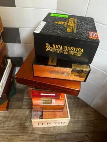 DESCRIPTION: (8) ASSORTED EMPTY CIGAR BOXES LOCATION: BAR / MAIN FLOOR THIS LOT IS: ONE MONEY QTY: 1