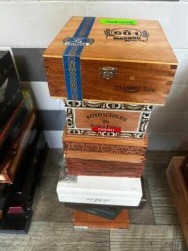DESCRIPTION: (8) ASSORTED EMPTY CIGAR BOXES LOCATION: BAR / MAIN FLOOR THIS LOT IS: ONE MONEY QTY: 1