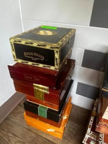 DESCRIPTION: (8) ASSORTED EMPTY CIGAR BOXES LOCATION: BAR / MAIN FLOOR THIS LOT IS: ONE MONEY QTY: 1