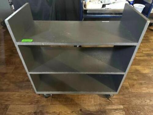 DESCRIPTION: THREE TIER WOODEN WAITERS / BUS CART. ADDITIONAL INFORMATION CONTENTS ARE NOT INCLUDED LOCATION: BAR / MAIN FLOOR QTY: 1