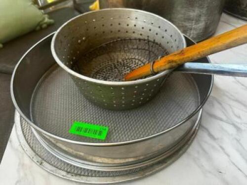 DESCRIPTION: FLOUR SIFTER, (2) COOLING RACKS, AND (1) STAINLESS SLOTTED SCOOP. LOCATION: MAIN FLOOR THIS LOT IS: ONE MONEY QTY: 1