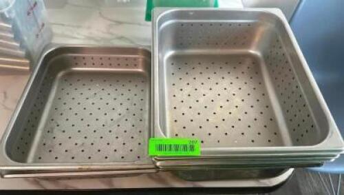 DESCRIPTION: (4) ASSORTED HALF SIZE SLOTTED STAINLESS INSERTS ADDITIONAL INFORMATION 4" AND 2" DEEP LOCATION: MAIN FLOOR THIS LOT IS: SOLD BY THE PIEC
