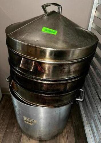 DESCRIPTION: LARGE STAINLESS STOCK POT W/ (5) STEAMER TRAYS AND LID LOCATION: MAIN FLOOR QTY: 1