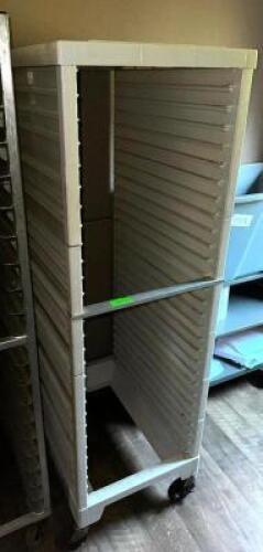 DESCRIPTION: TWENTY PAN ROLL ABOUT RAY RACK ( PLASTIC ) ADDITIONAL INFORMATION FRONT LOAD LOCATION: MAIN FLOOR QTY: 1