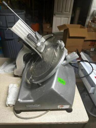 DESCRIPTION: HOBART 23C COMMERCIAL DELI SLICER BRAND / MODEL: HOBART LOCATION: BASEMENT QTY: 1