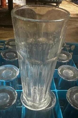 DESCRIPTION: (25) TALL ICE CREAM SUNDAY GLASSES ADDITIONAL INFORMATION W/ GLASS RACK LOCATION: BASEMENT THIS LOT IS: SOLD BY THE PIECE QTY: 25