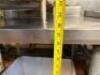 DESCRIPTION: 36" STAINLESS STEEL TABLE WITH BACKSPLASH AND UNDERSTORAGE SIZE: 36"X30"X32" LOCATION: KITCHEN QTY: 1 - 5