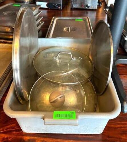 DESCRIPTION: ASSORTED STOCK POT LIDS AND BUS TUB LOCATION: MAIN DINING QTY: 1