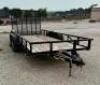 DESCRIPTION: 16 FOOT DOUBLE AXLE UTILITY TRAILER BRAND/MODEL: DOOLITTLE INFORMATION: GVWR: 7000LBS, SPRING ASSIST RAMPS, 2 5/16 INCH BALL SIZE: 77"X16 - 2