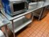 DESCRIPTION: 72" X 30" STAINLESS TABLE. ADDITIONAL INFORMATION RISER IS NOT INCLUDED SIZE 72" X 30" LOCATION: KITCHEN QTY: 1