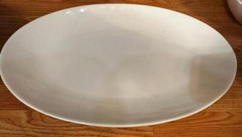 DESCRIPTION: (16) 16" CHINA PLATTERS SIZE 16" LOCATION: MAIN SEATING THIS LOT IS: SOLD BY THE PIECE QTY: 16